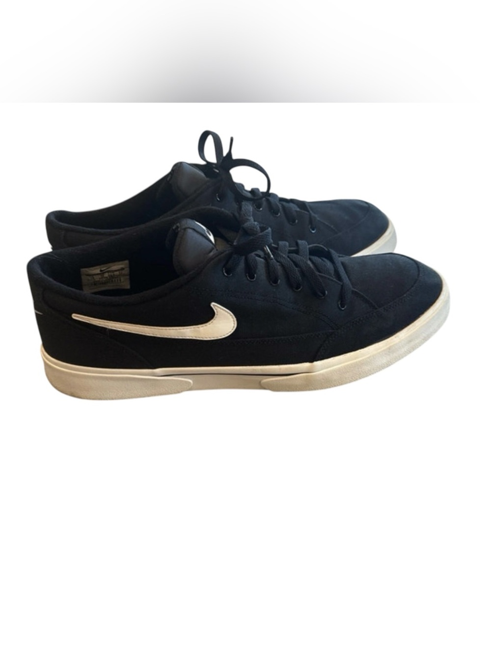 Nike Black Suede Low-Top Sneakers with White Swoosh